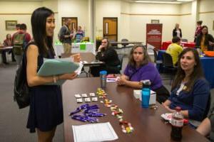 Students hosting an event at the Cynthia Ann Parker College of Liberal Arts